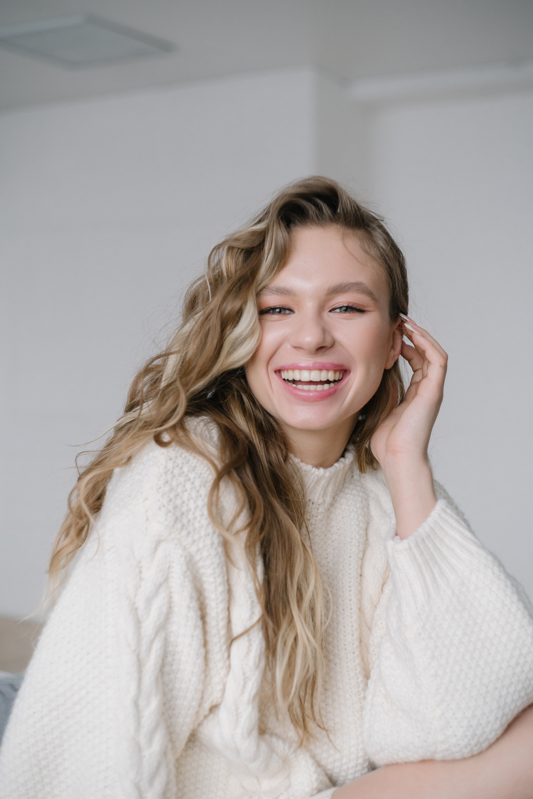 A Happy Woman in a Sweater